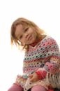 Small girl in a knitted poncho